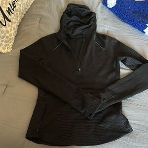Luluemon Black hoodie with face covering.